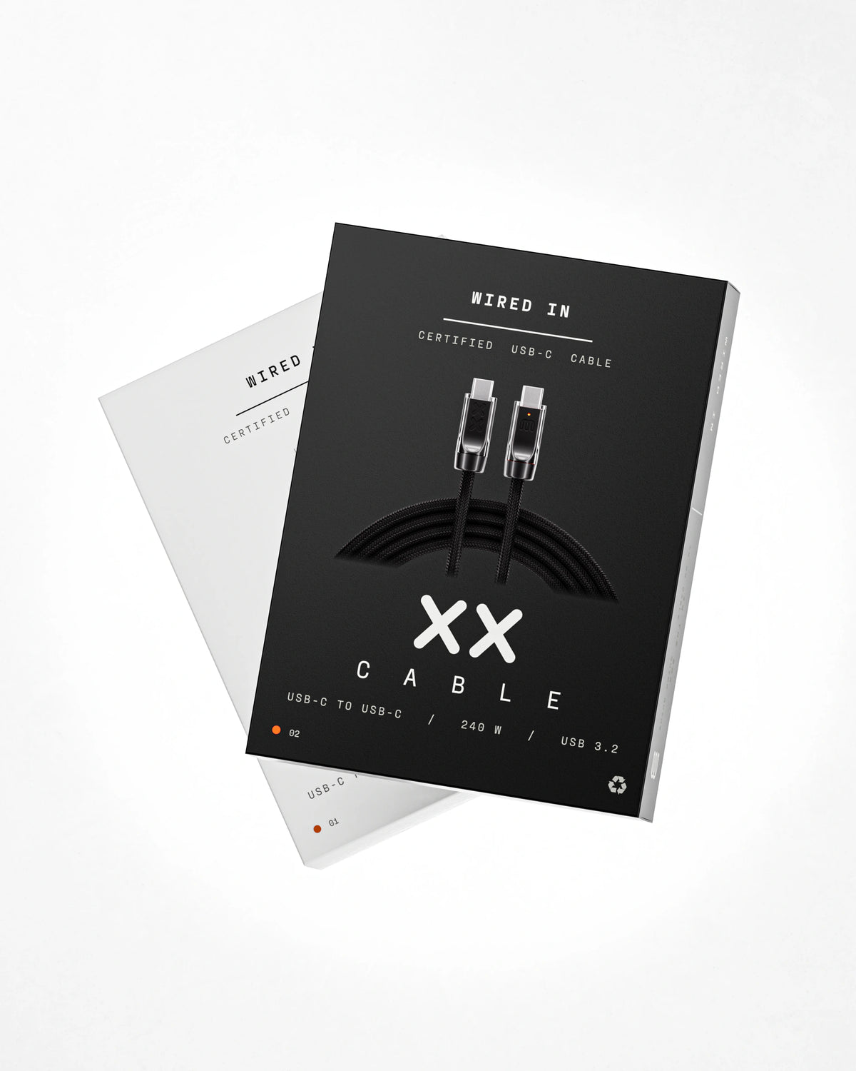 XX Cable retail boxes overhead, Pepper laid over Salt — front panel showing the cable, the XX mark and the spec line