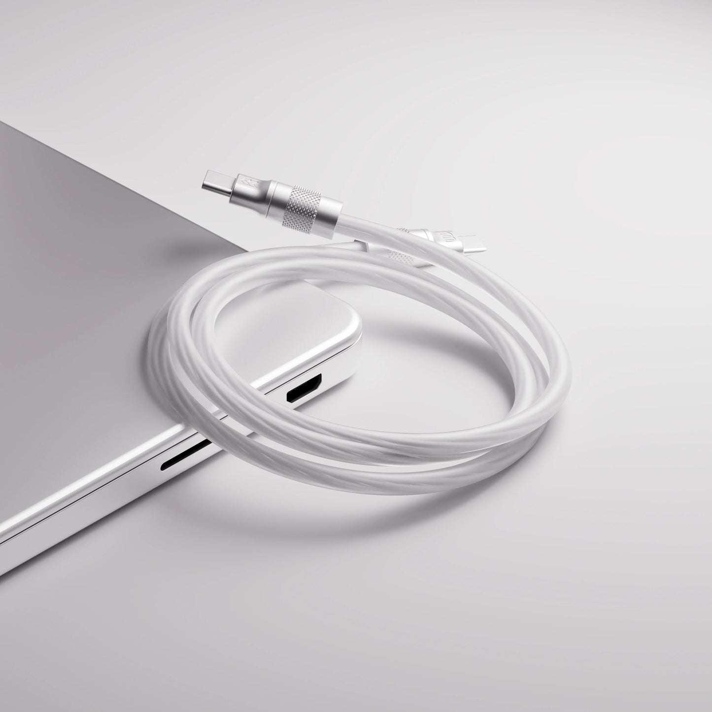 X-Ray Cable — draped over a laptop