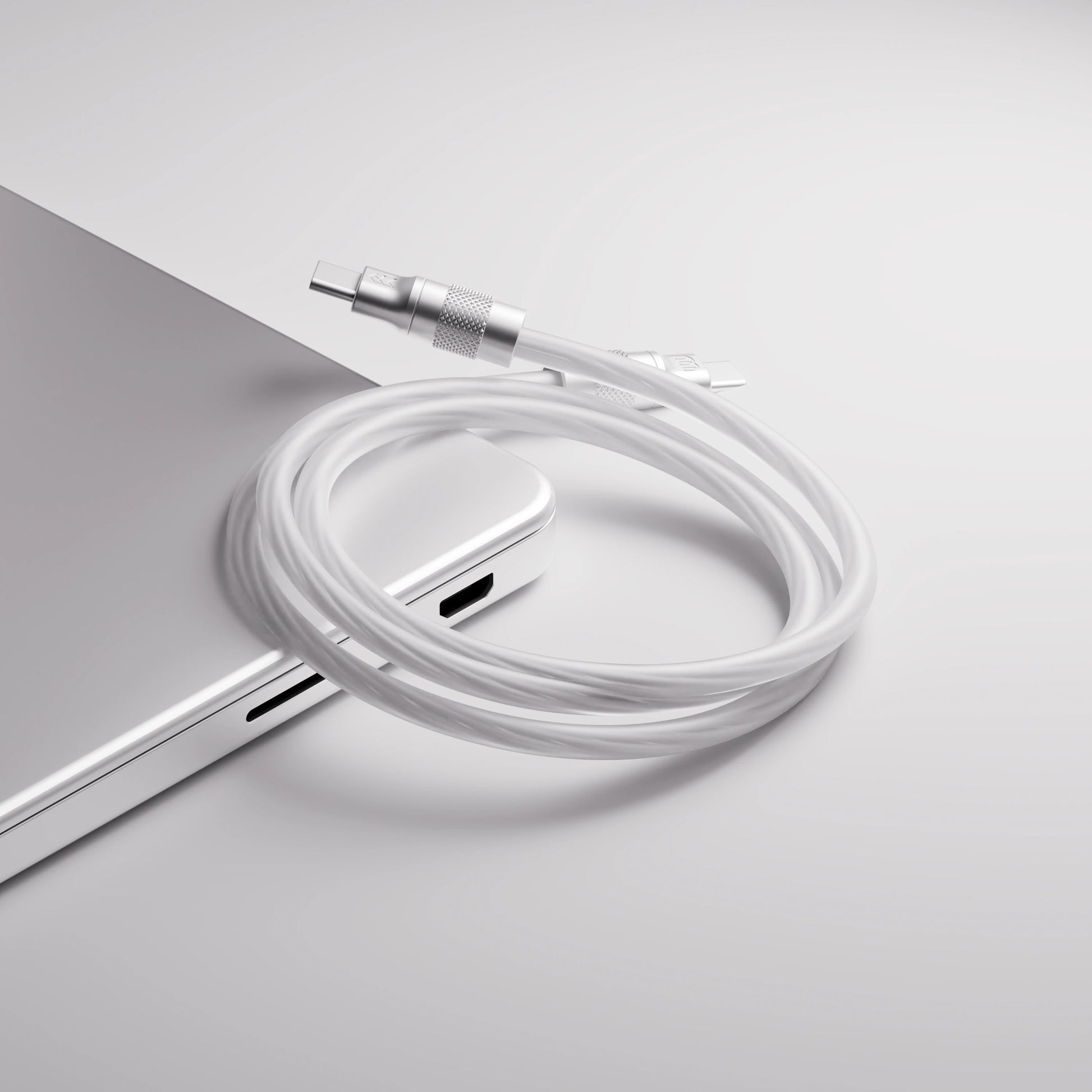 X-Ray Cable — draped over a laptop