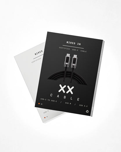 XX Cable retail boxes overhead, Pepper laid over Salt — front panel showing the cable, the XX mark and the spec line