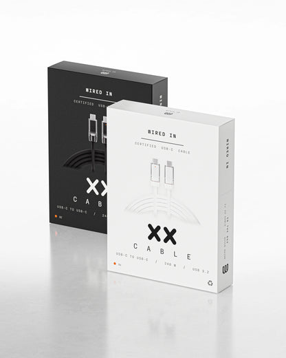 XX Cable retail boxes, Salt and Pepper standing side by side — spec-sheet front panel with the XX mark, USB-C to USB-C, 240W, USB 3.2