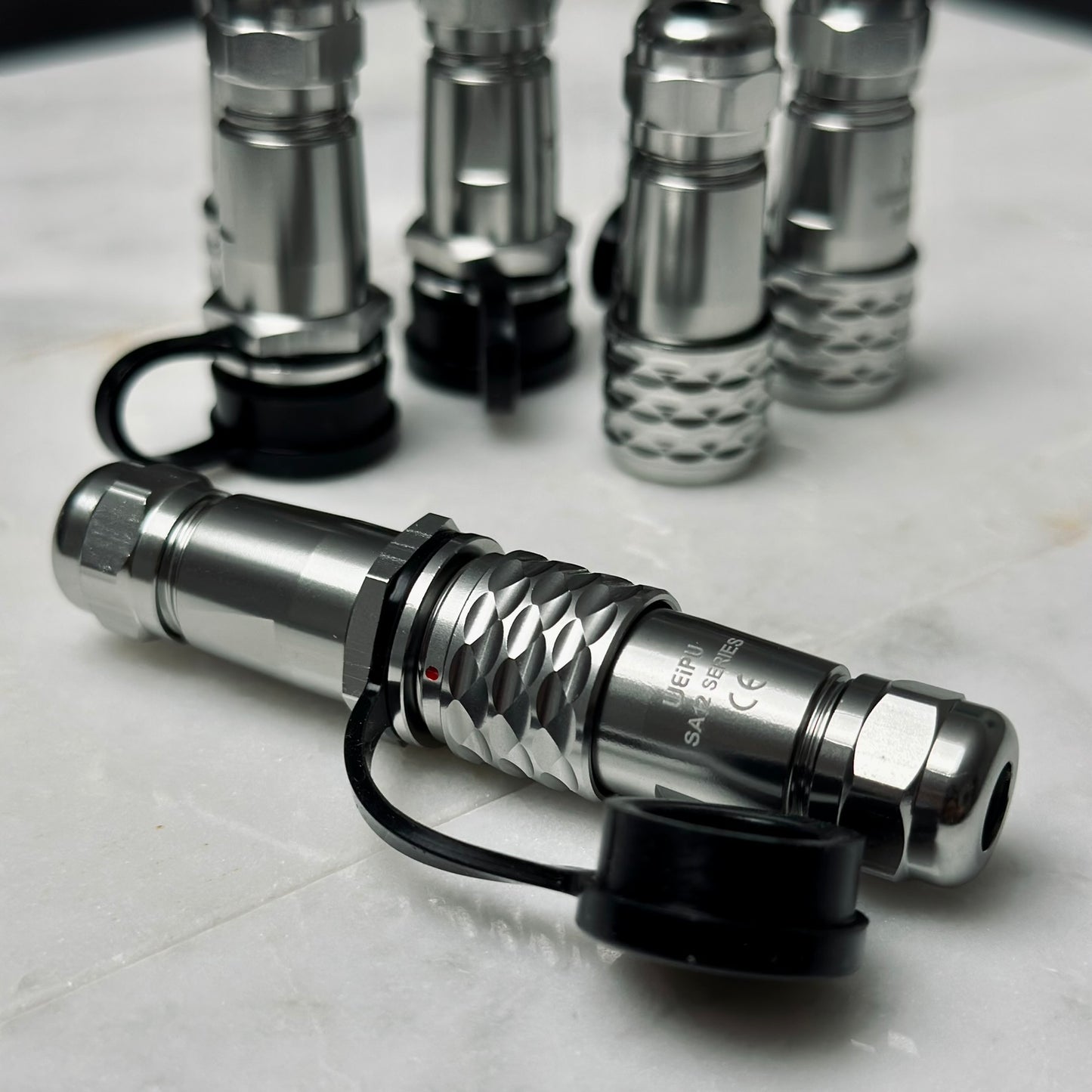 Closeup of WEIPU SF12/SA12 connector in chrome plated brass