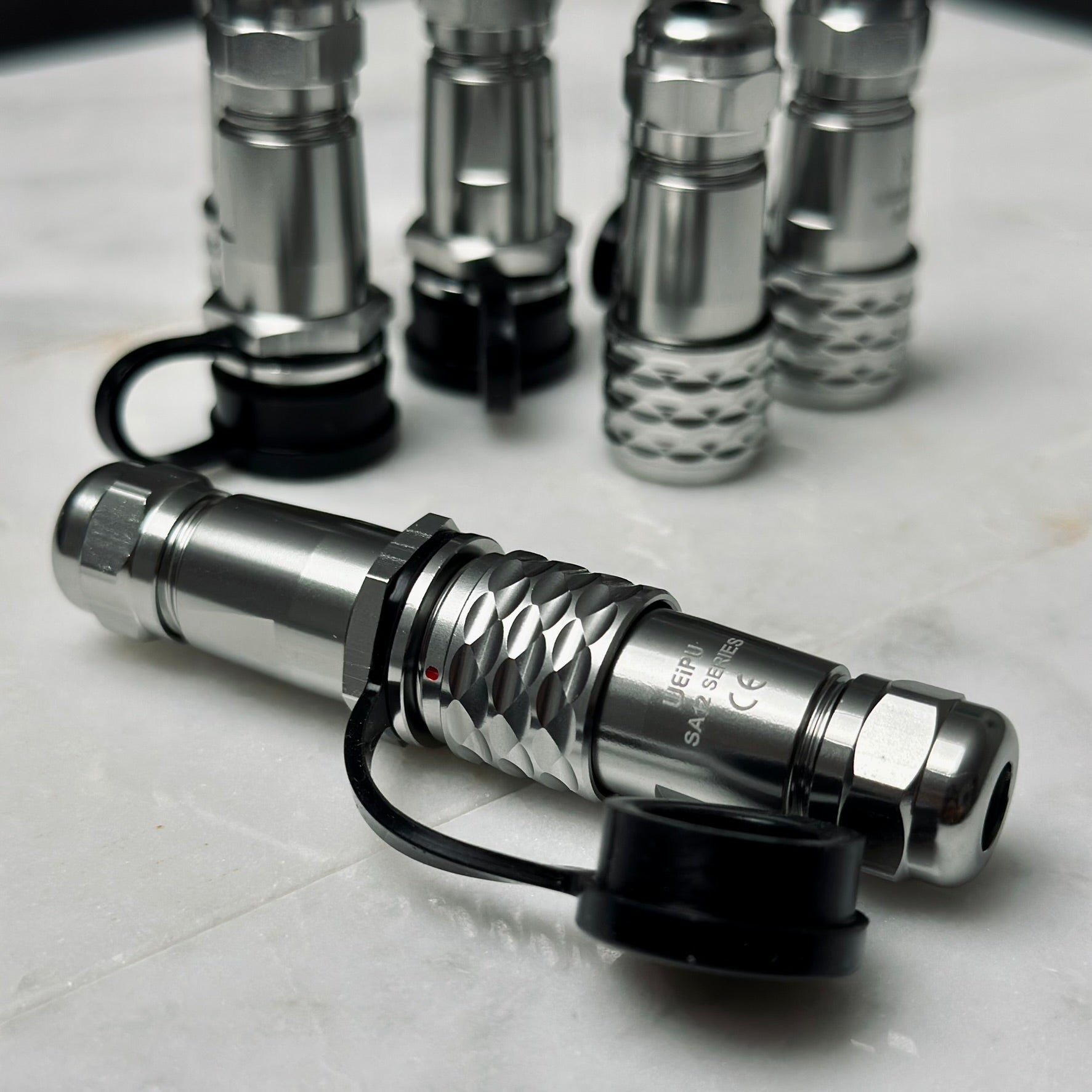 Closeup of WEIPU SF12/SA12 connector in chrome plated brass